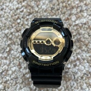 Casio Men's Digital GD-100GB-1 Black and Gold Watch